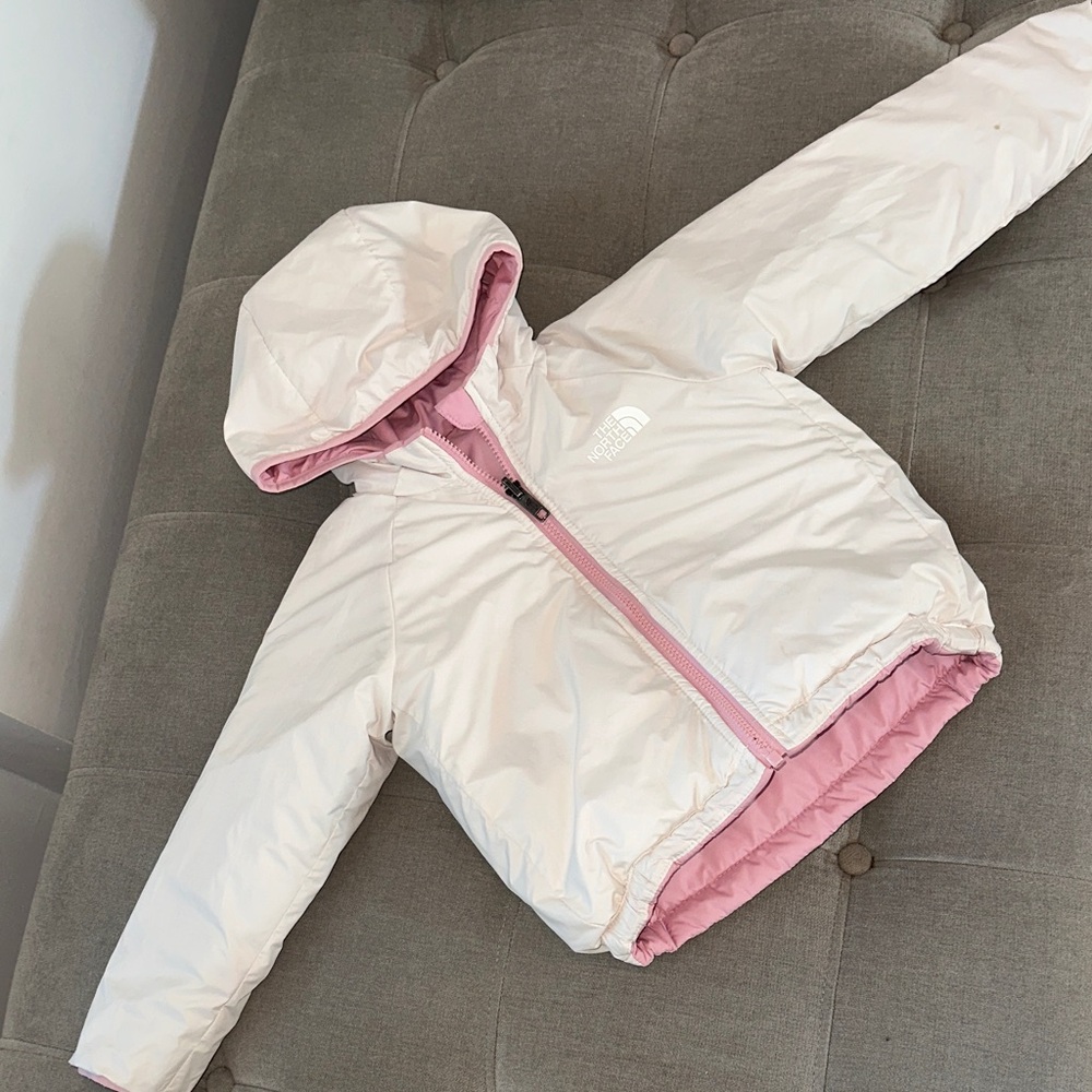 North face Kids Pink and White Hooded Jacket reversible.